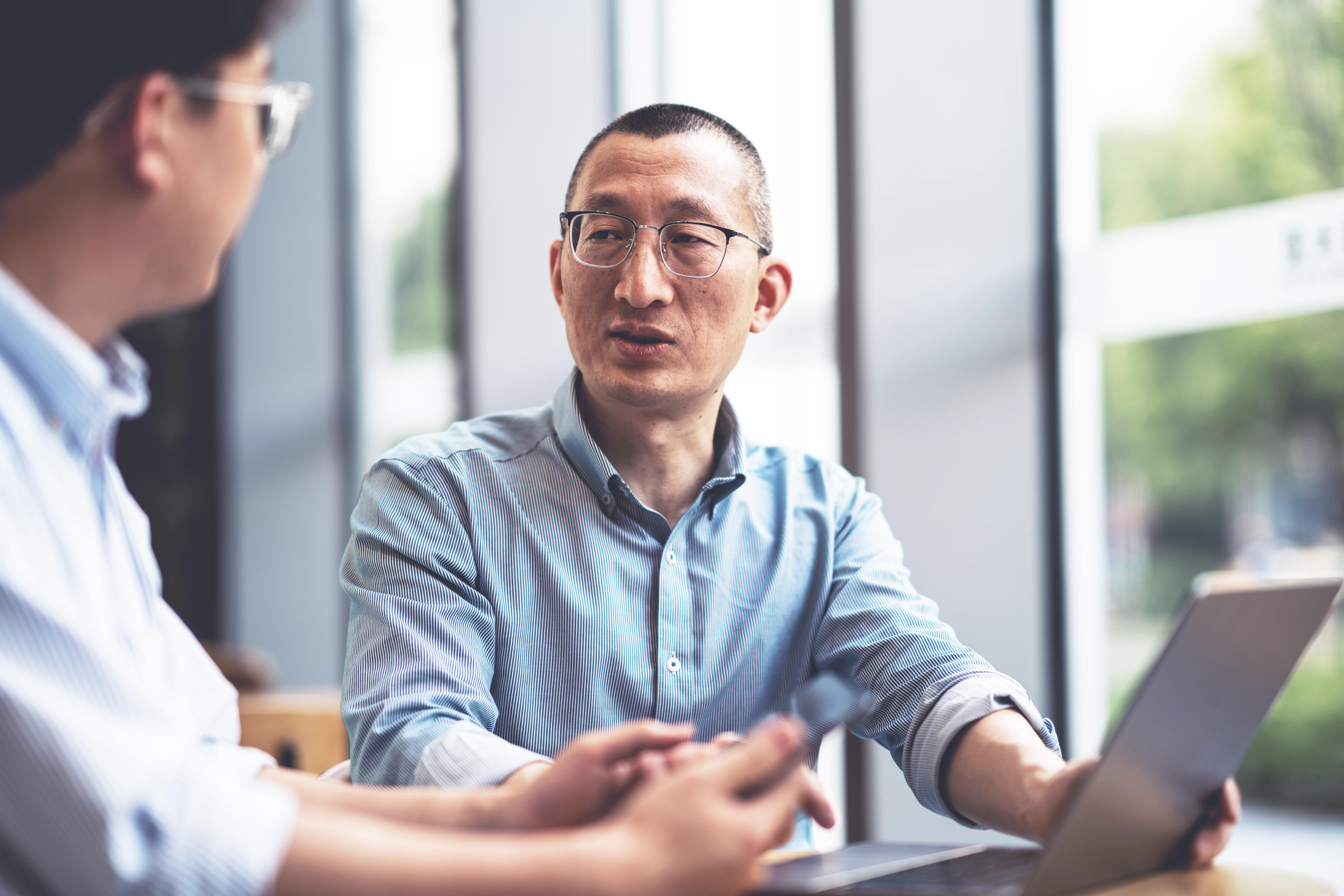 two colleagues having a business discussion