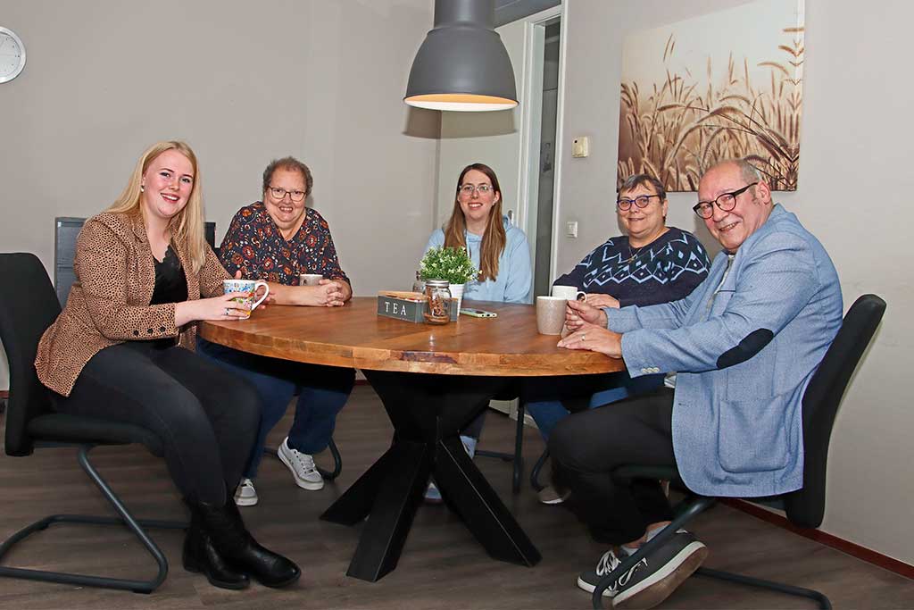 Kim met clienten