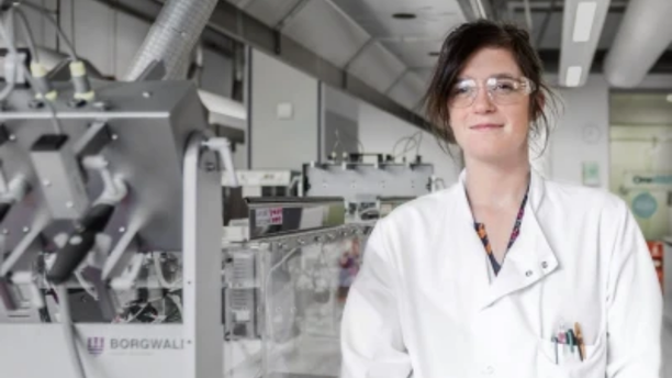 Scientist in lab with equipment