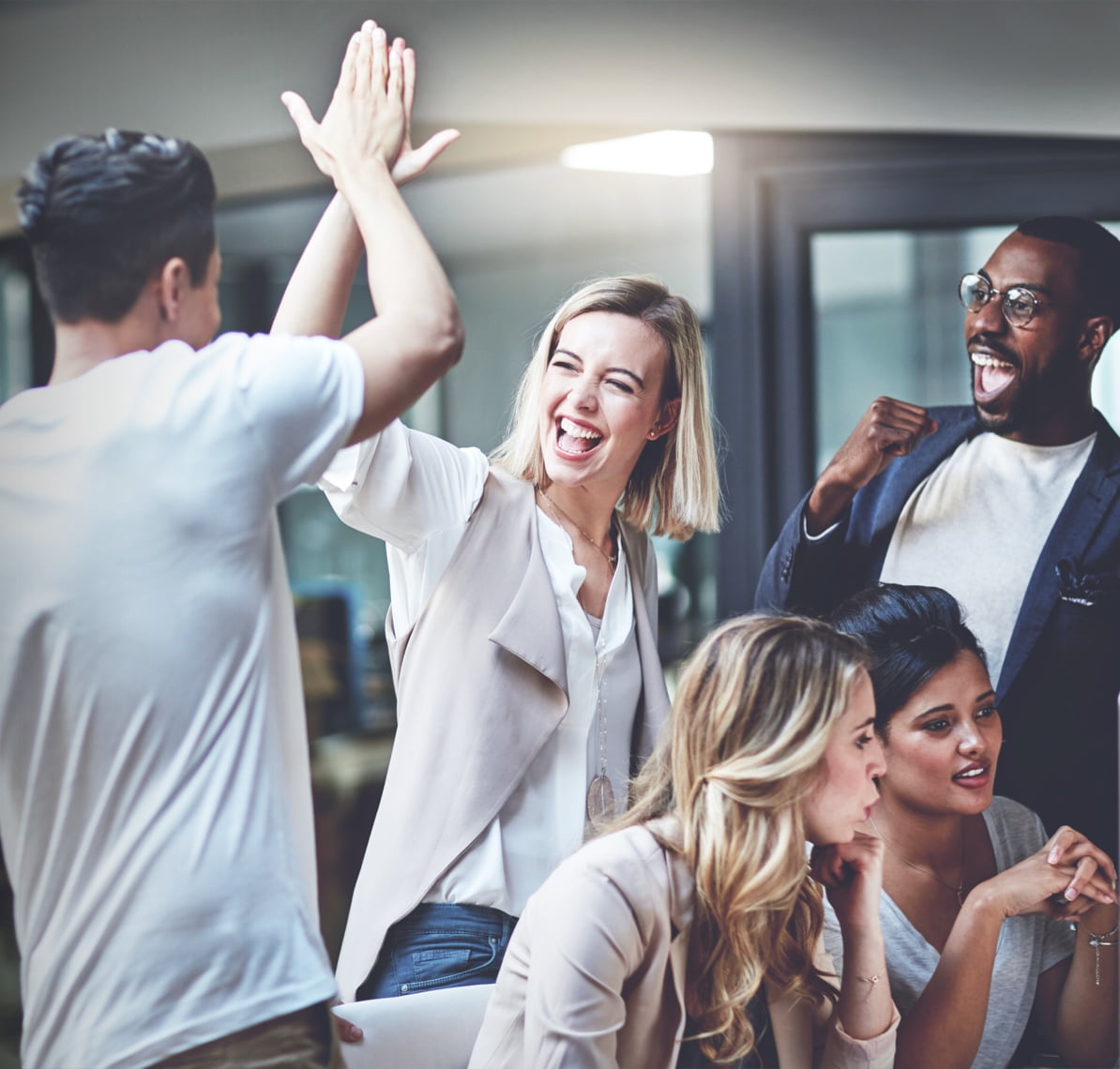 Two people high celebrating giving each other a high five