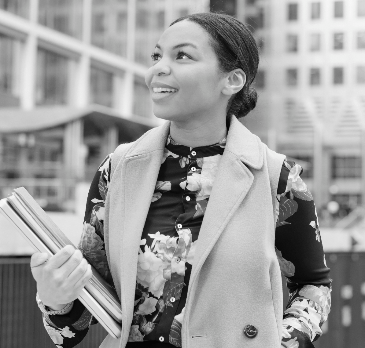 A woman with a folder in her hand