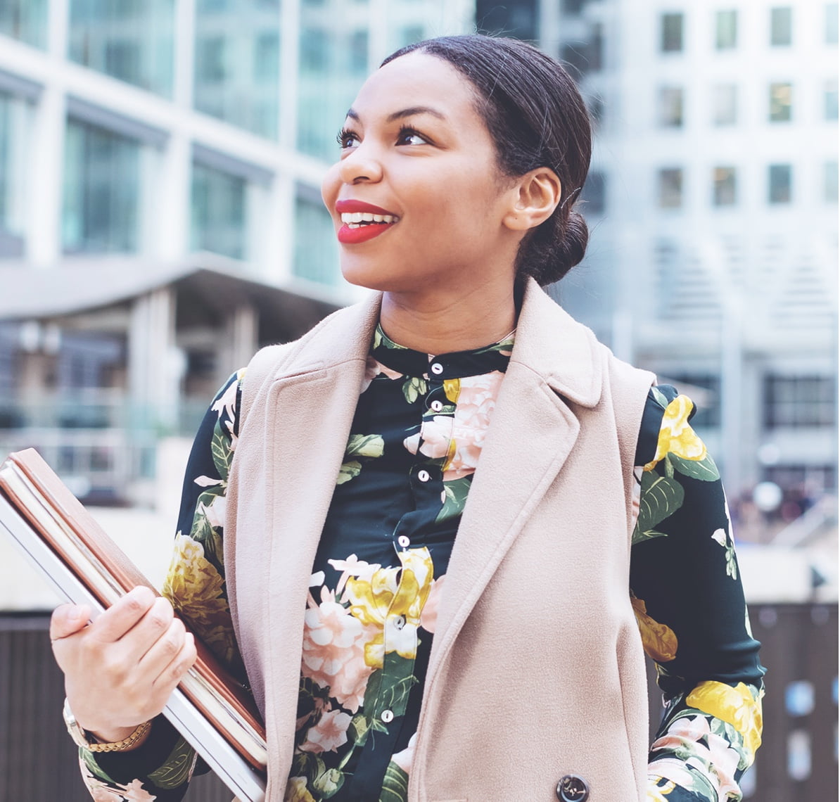 A woman with a folder in her hand