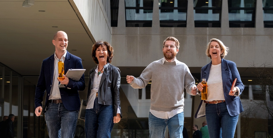 4 colleagues in front of the ING building