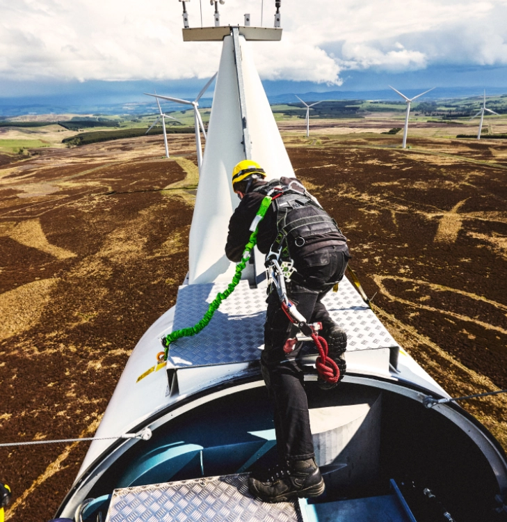 Maintenance worker on a windmill