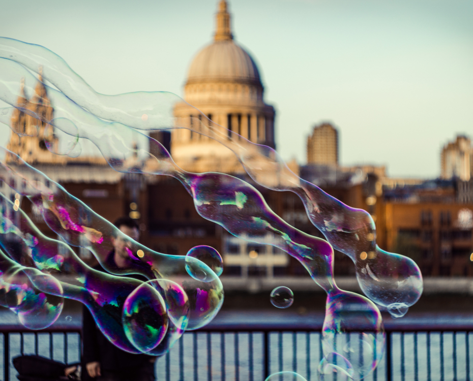 Bubbles before a city skyline