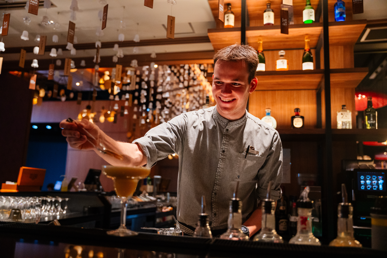 Barman preparing a drink