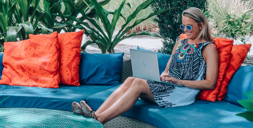A woman working on her computer in a Club Med Resort