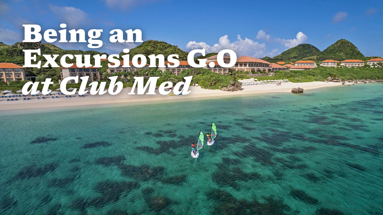 The sea with some kite surfers near the beach.