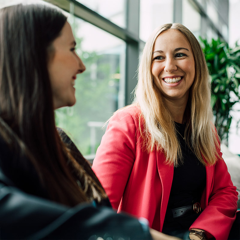 Two Sanofians in conversation at office location
