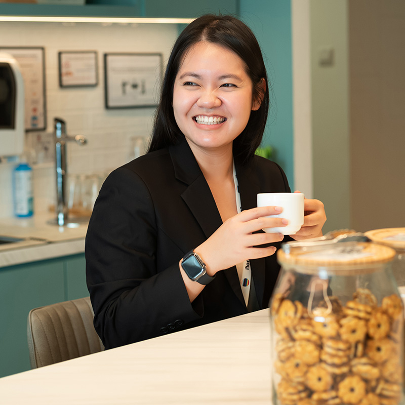 Sanofian drinking coffee in Singapore office