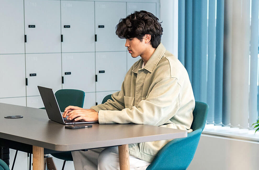 Young woman studying on a laptop