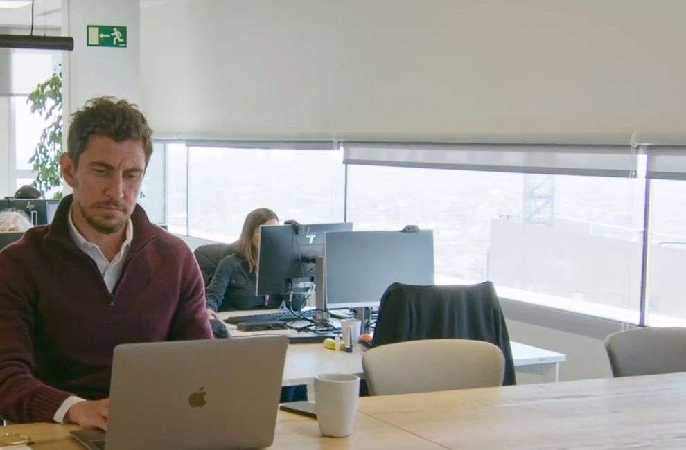 Young man working at his laptop