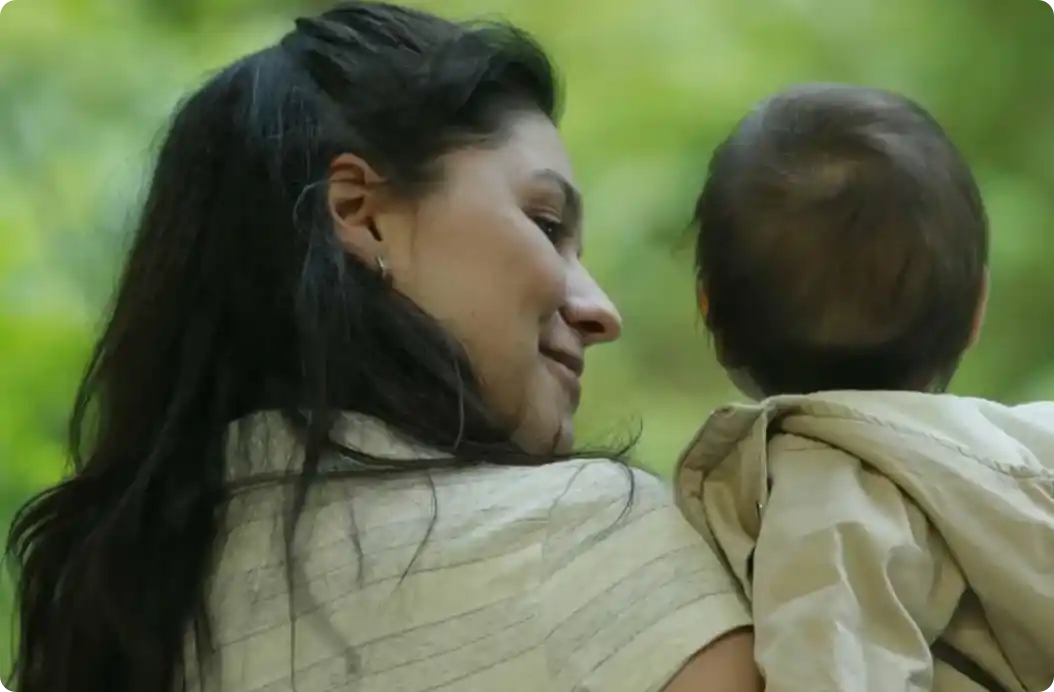 Woman holding a child