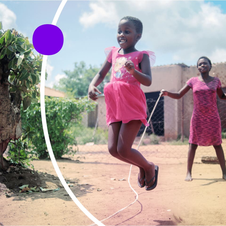 Young girl jumping rope