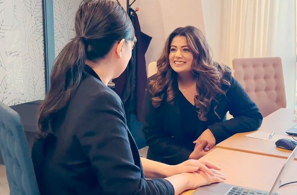 Man presenting to another coworker