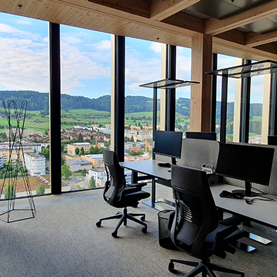 Modern office with scenic window view.