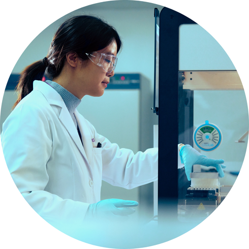 Young person in a lab coat taking samples