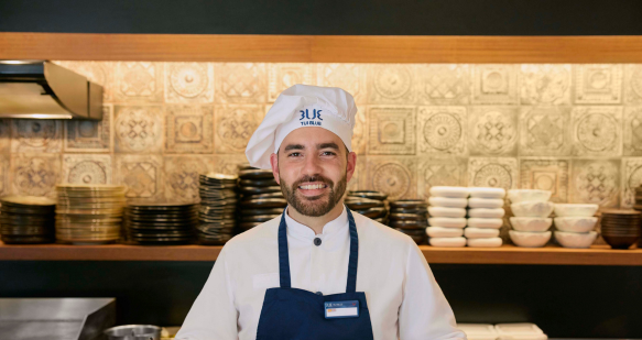 A Chef smiling at the camera