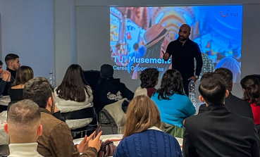 A TUI Greece Port Team Manager conducts a presentation to students in Athens