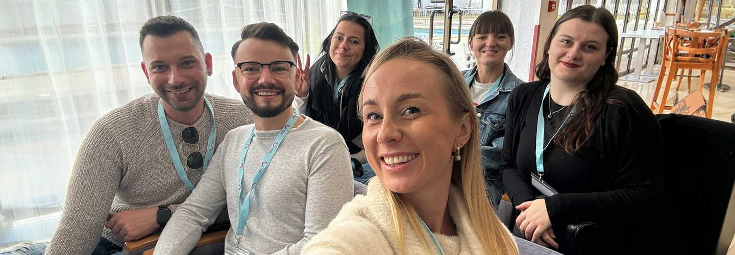 A group of colleagues taking a selfie