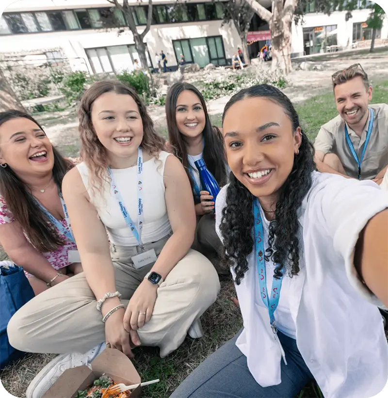 Group of people smiling for the camera