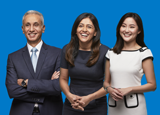 Three people smiling on blue background