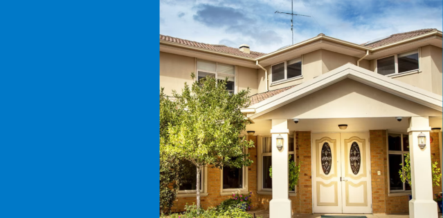 Blue panel left, house and garden right