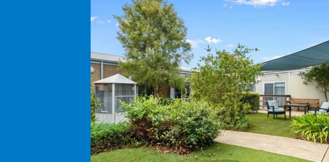 Garden courtyard with trees and walkway