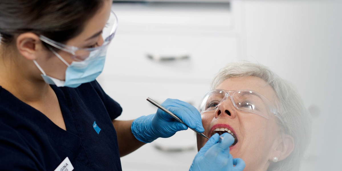Dental exam on patient wearing goggles