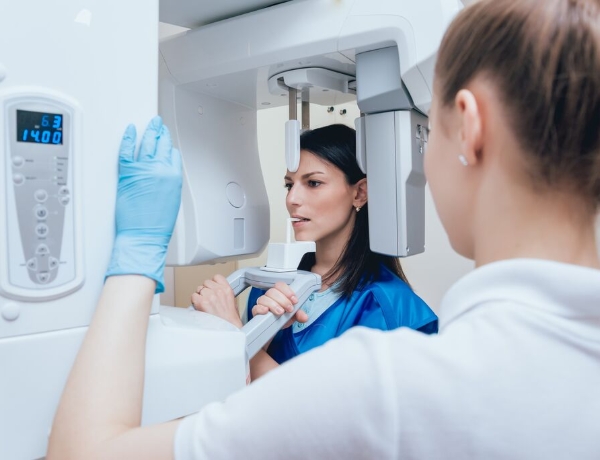Dental professionals providing treatment to a child patient