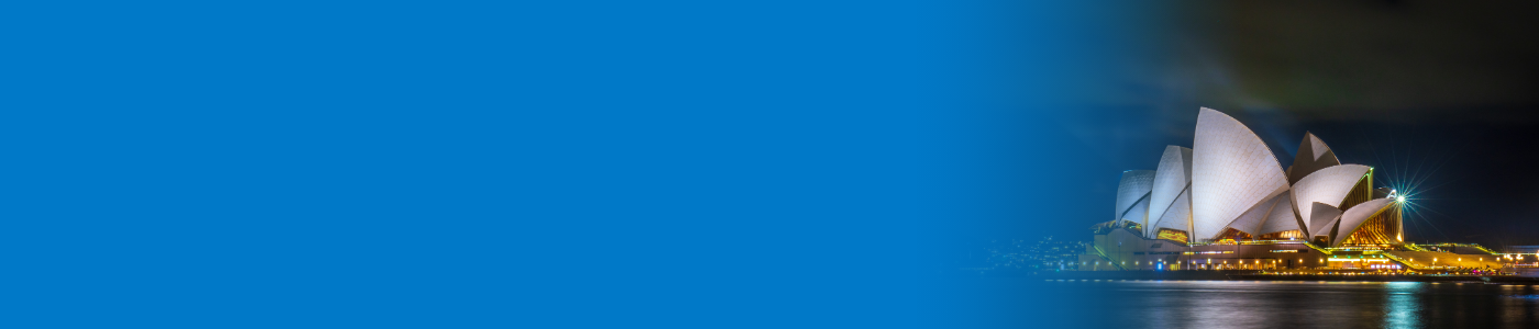 Sydney Opera House glowing at night on blue banner