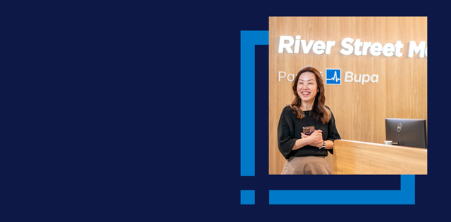 Person smiling on blue background