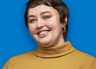 Woman smiling on blue background