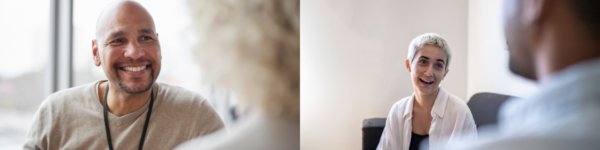 Two people engaged in a conversation indoors