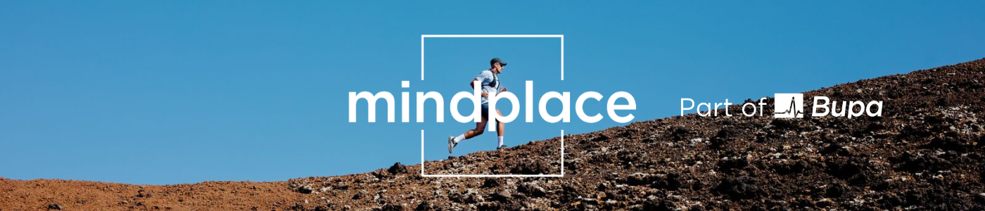 Runner on rocky hill with Mindplace Bupa branding