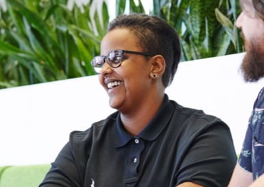 Smiling employee wearing glasses