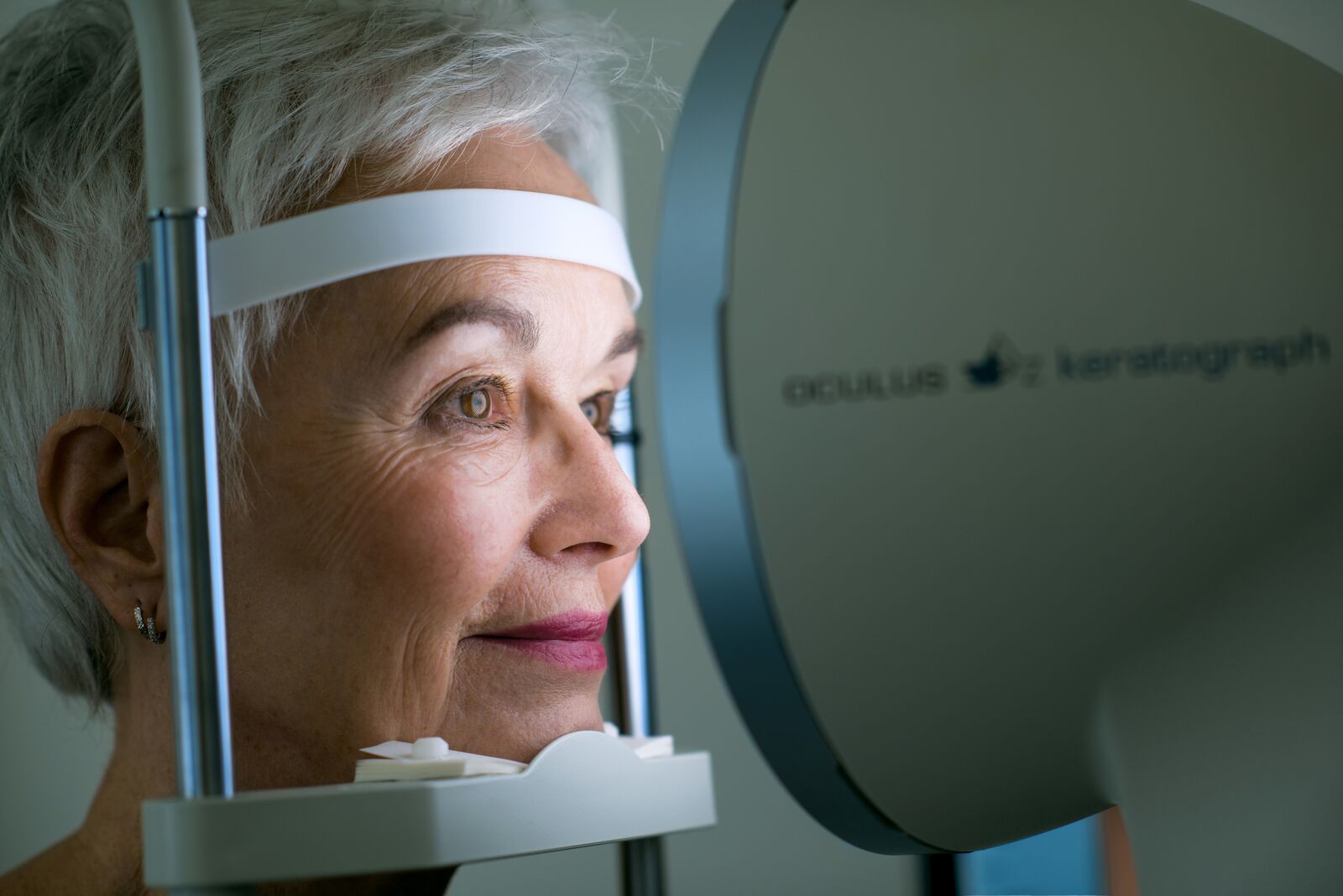 Person at eye exam machine, close-up