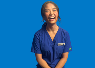 Healthcare worker in blue uniform on blue background