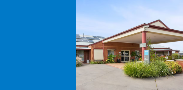 Brick clinic entrance with covered porch