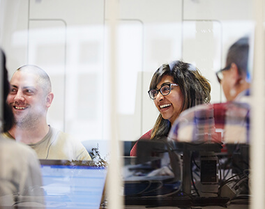 People collaborating in a modern office meeting room