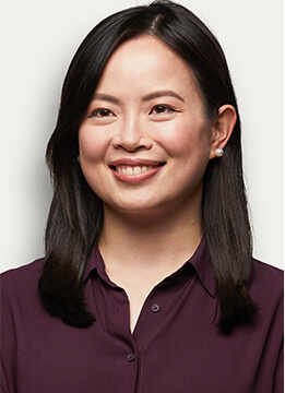 Professional headshot on a neutral background