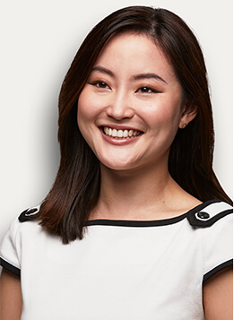 Professional headshot on a neutral background