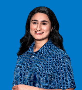 Woman smiling on blue background