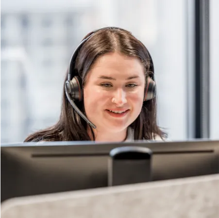 Customer support agent wearing headset