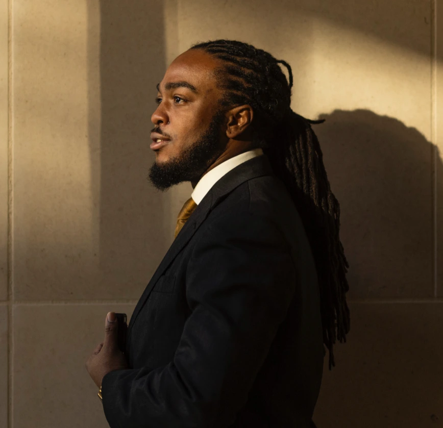 Man in suit looking into the distance