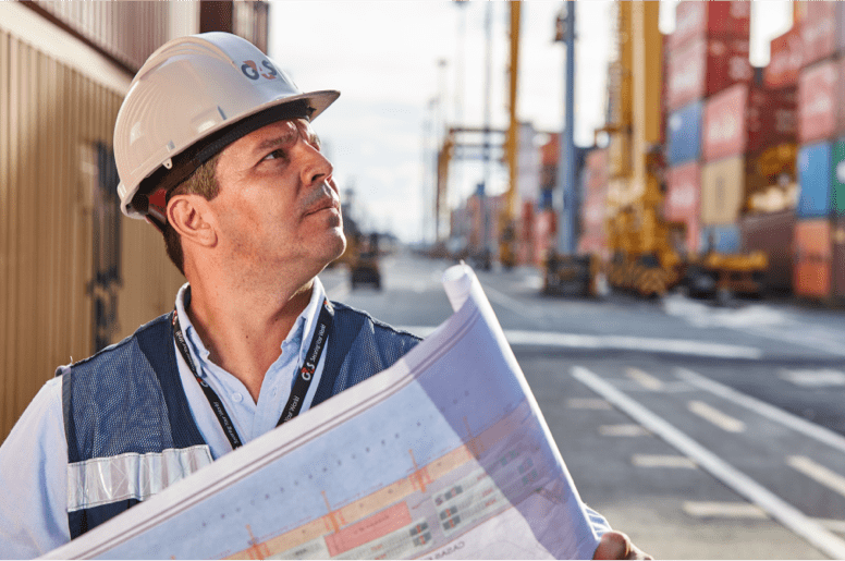 G4S employee on a building site with a map in his hands