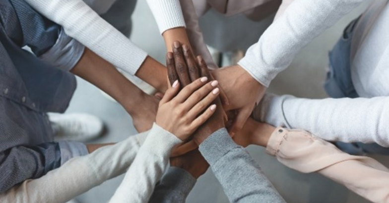 Team chatting in office space