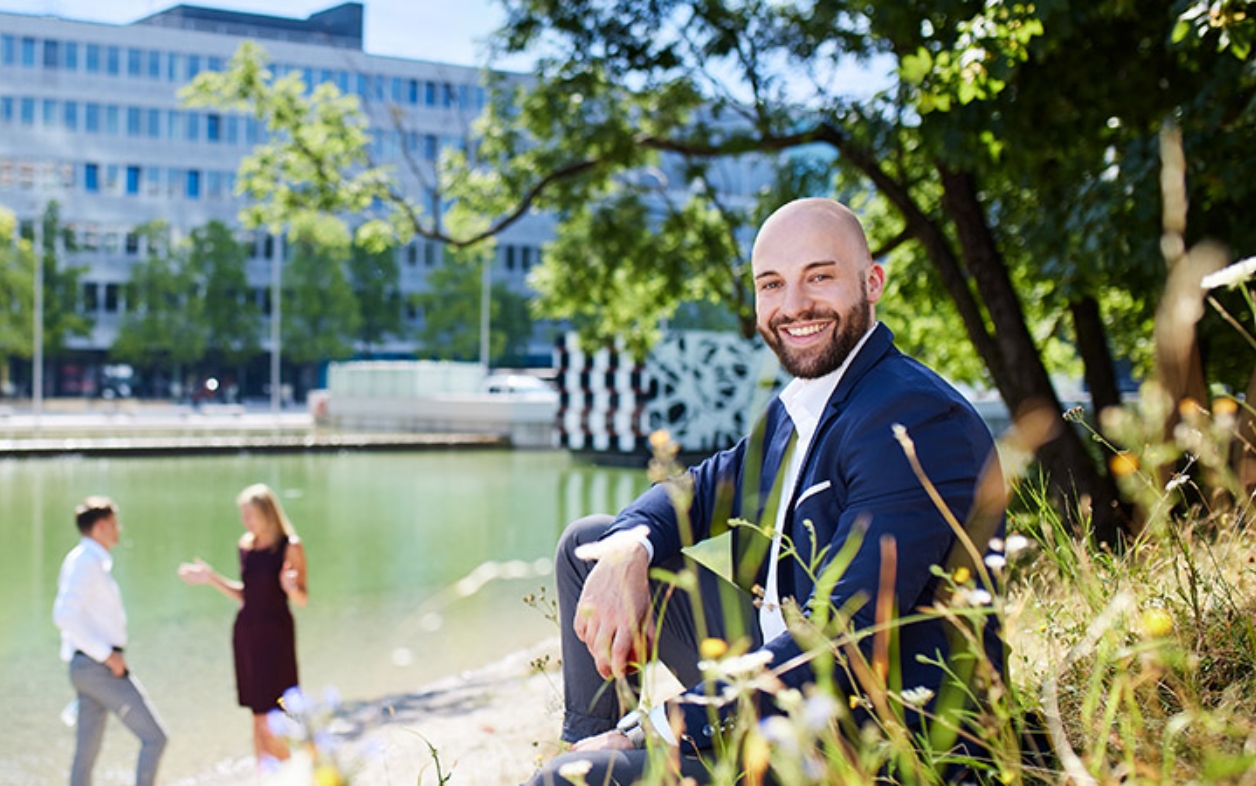 People near a riverside in city
