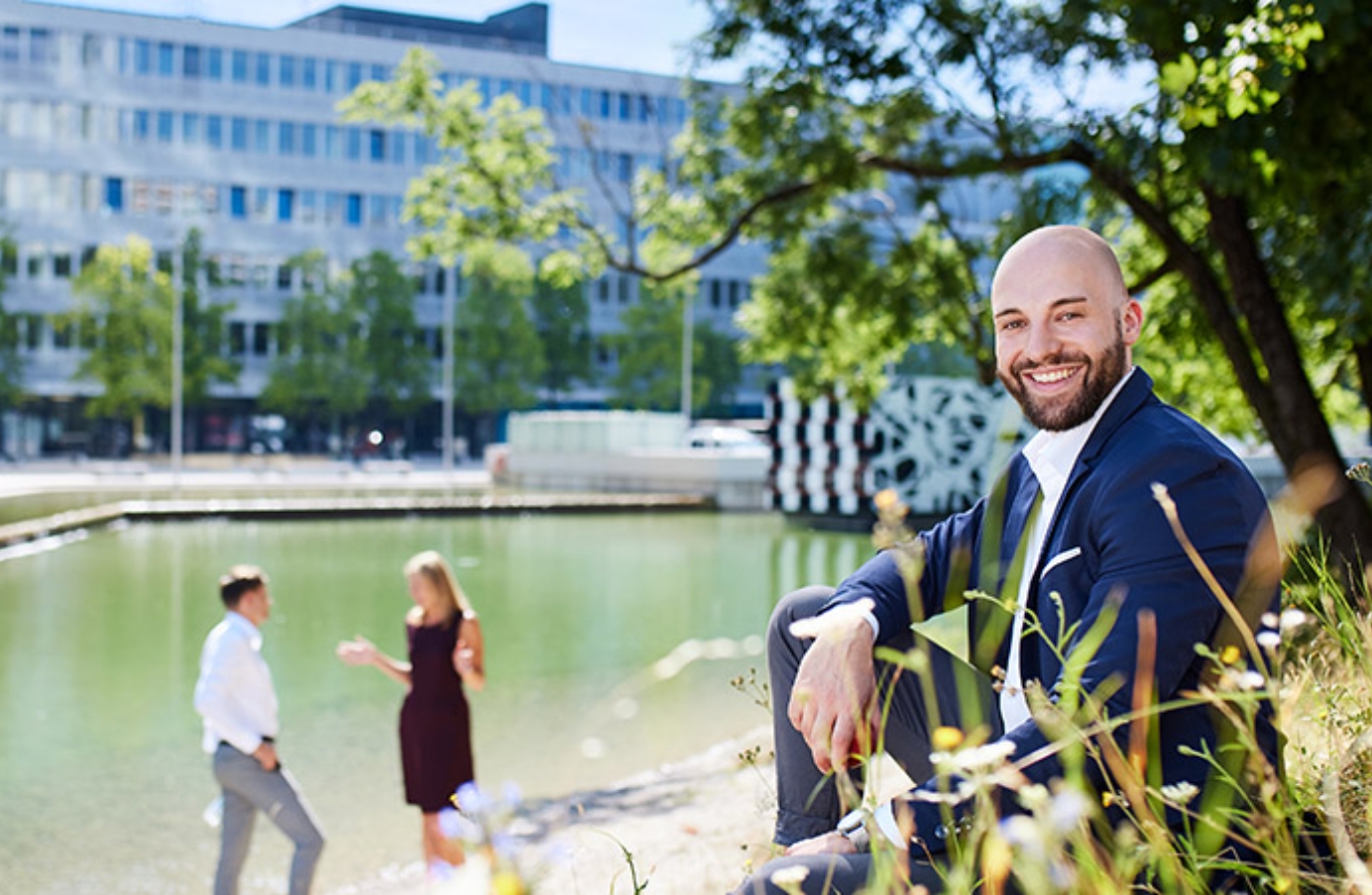 People near a riverside in city
