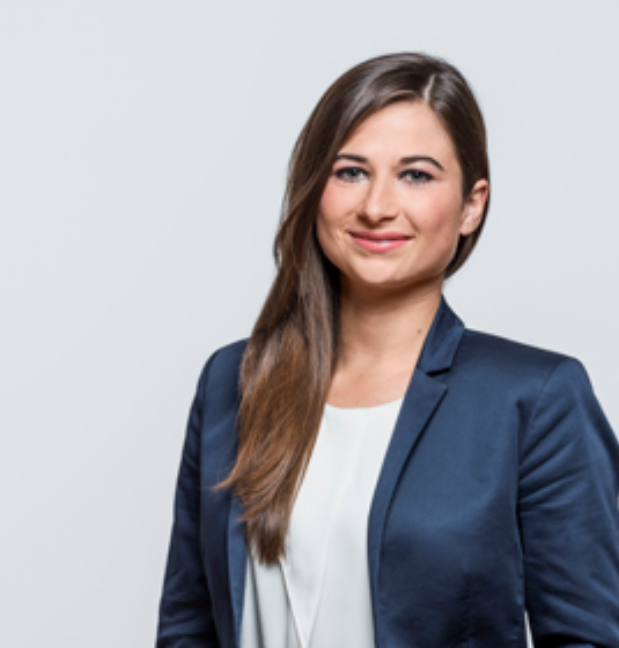 Person wearing a navy blazer